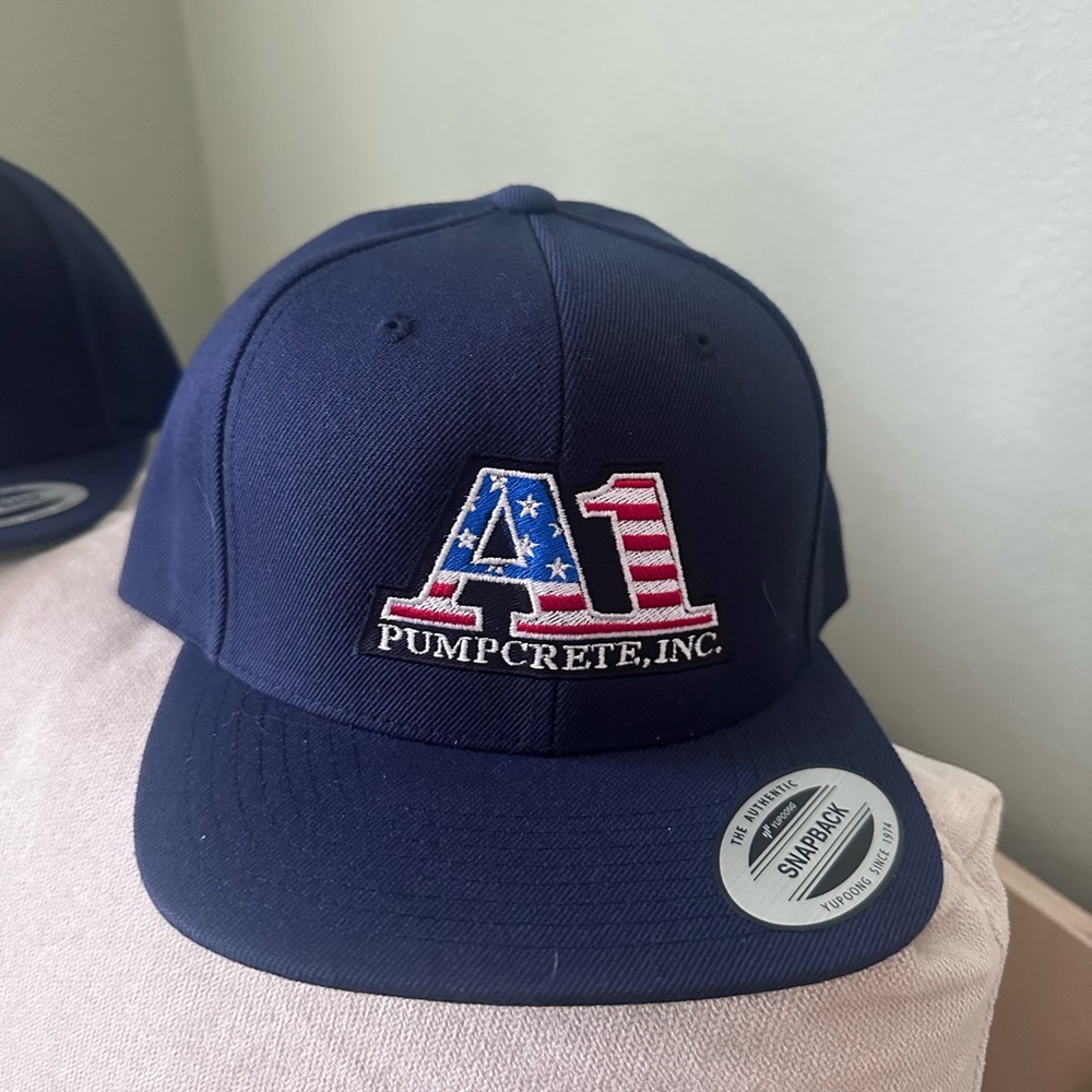 Navy A1 Pumpcrete Inc. Snapback Hat